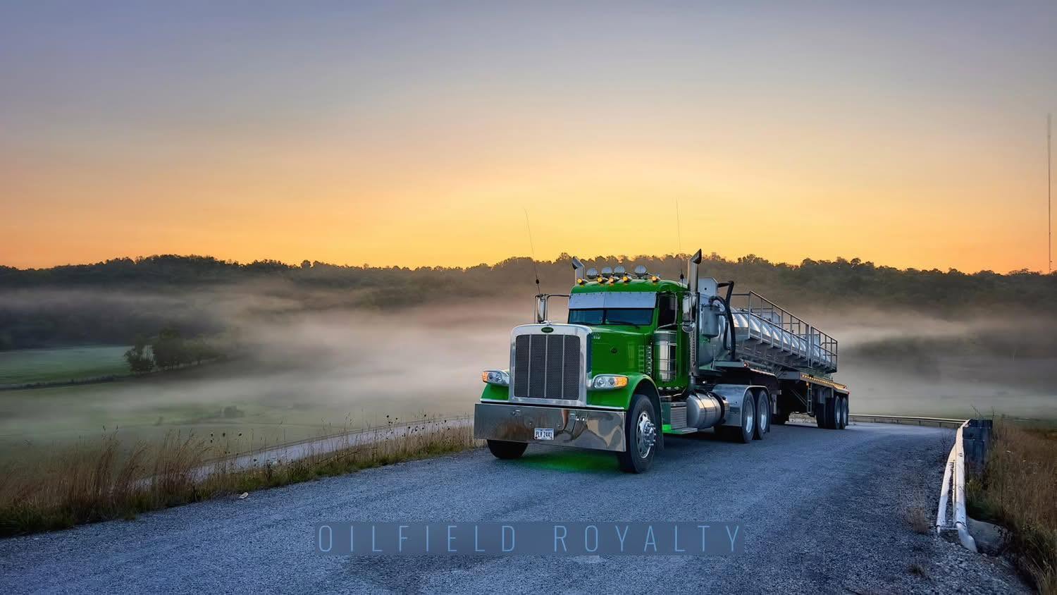 Titan tanker truck at sunrise on an oilfield road